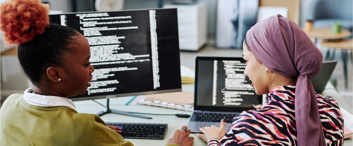 Two developers working together to review code