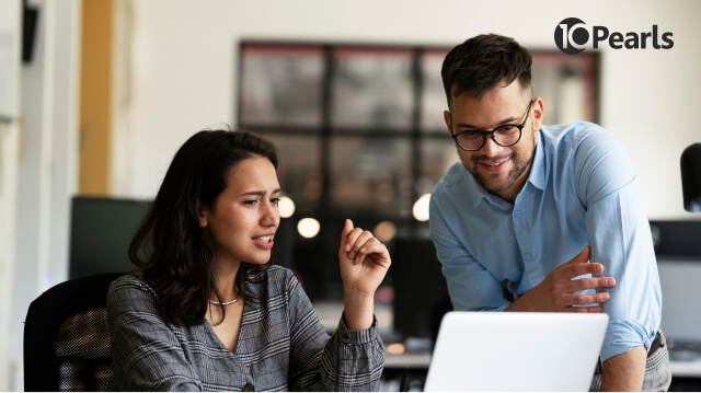 A software development outsourcing team collobrating and discussing a project