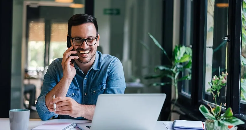 man in office talking on call
